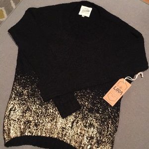 Black and gold sweater